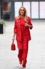 AMANDA HOLDEN in Red Trouser Suit Leaves Heart Radio Studios 03/27/2025