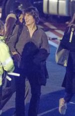ANA DE ARMAS and Tom Cruise at London Heliport Battersea in London 03/14/2025
