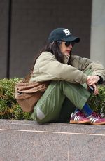 ANNE HATHAWAY Sitting on a Small Fence 03/12/2025
