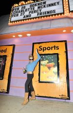 CHARLOTTE MCKINNEY Poses Under the Marquee Before Taking Stage for a Stand-up Comedy Show in Los Angeles 02/27/2025