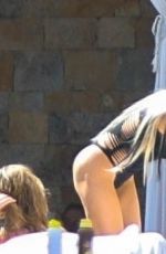 CHRISTINE QUINN in Bikinis in Cabo 03/21/2025