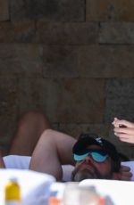 CHRISTINE QUINN in Bikinis in Cabo 03/21/2025