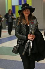 DAKOTA JOHNSON Arrives at JFK Airport in New York 02/14/2025