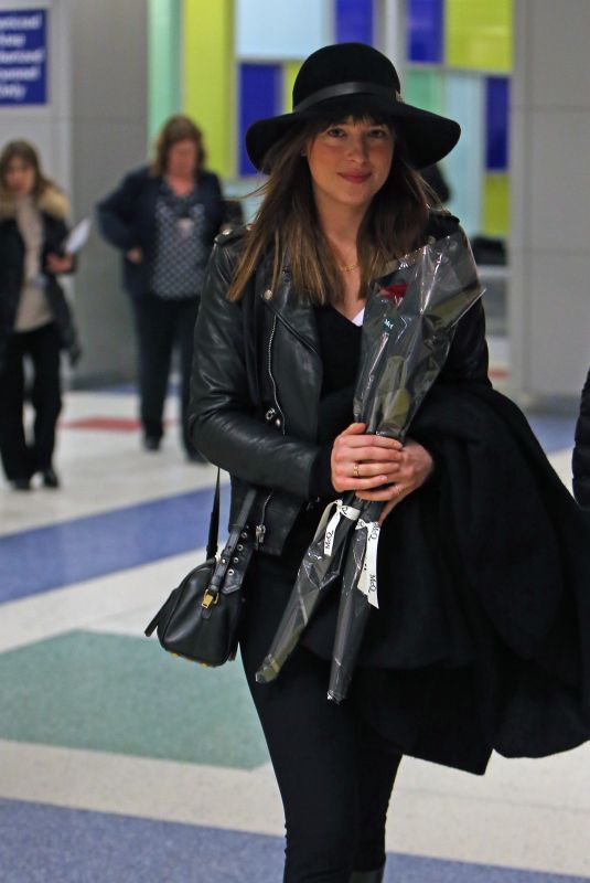 DAKOTA JOHNSON Arrives at JFK Airport in New York 02/14/2025
