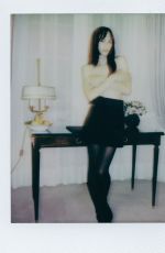 DEVON ROSS at a Photoshoot, March 2025
