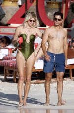 DEVON WINDSOR in Swimsuit at a Beach in St Barts 03/27/2025