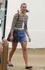 DUA LIPA Enjoying a Beach Day in Sydney 03/30/2025