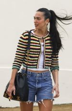DUA LIPA Enjoying a Beach Day in Sydney 03/30/2025