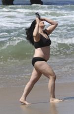 ELIZABETH REGAL in a Black Bikini at Hermosa Beach 03/21/2025