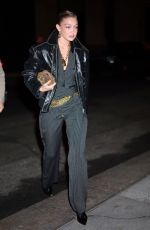GIGI HADID Arrives at Rabanne Million Gold for Her Launch Party in New York City 03/13/2025