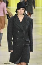GIGI HADID Walks Runway at Miu Miu Fall Winter 2025/2026 Show in Paris 03/11/2025