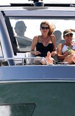 GISELE BUNDCHE in Swimsuit and Joaquim Valente at a Boat Ride with Friends in Miami 03/15/2025