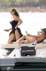 GISELE BUNDCHE in Swimsuit and Joaquim Valente at a Boat Ride with Friends in Miami 03/15/2025