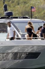 GISELE BUNDCHE in Swimsuit and Joaquim Valente at a Boat Ride with Friends in Miami 03/15/2025