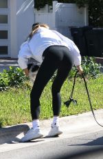 GISELE BUNDCHEN Out with Her Baby and Dogs in Miami Beach 03/18/2025