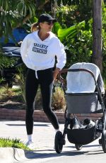 GISELE BUNDCHEN Out with Her Baby and Dogs in Miami Beach 03/18/2025