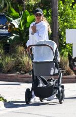 GISELE BUNDCHEN Out with Her Baby and Dogs in Miami Beach 03/18/2025