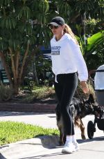 GISELE BUNDCHEN Out with Her Baby and Dogs in Miami Beach 03/18/2025
