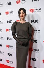 GRACIE ABRAMS at 2025 iHeartRadio Music Awards in Hollywood 03/17/2025
