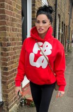 KATIE PRICE Out with Her New Lipgloss Tattooed on Her Lips from Killa Cosmetics 03/11/2025