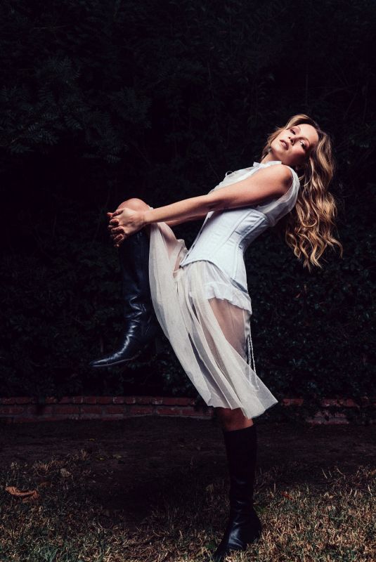 KELLI BERGLUND at a Photoshoot, March 2025