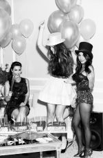 KIM, KOURTNEY and KHLOE KARDASHIAN in Glamour Magazine, January 2012