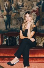 LILY JAMES at a Photoshoot, March 2025