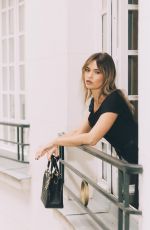 LILY JAMES at a Photoshoot, March 2025