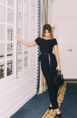 LILY JAMES at a Photoshoot, March 2025