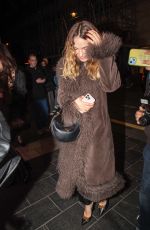 LILY JAMES Leaves an Elton John Concert in London 03/26/2025