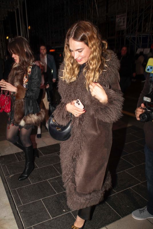 LILY JAMES Leaves an Elton John Concert in London 03/26/2025