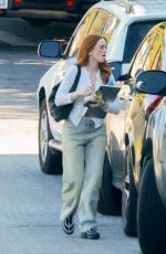 MADELAINE PETSCH Arrives at Tyga