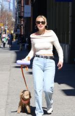 MILLIE BOBBY BROWN Out with Her Dog in New York 03/19/2025