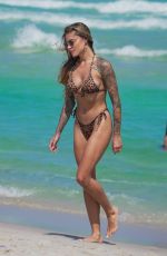 SOPHIA THOMALLA in a Leopard Print Bikini at a Beach in Miami 03/19/2025
