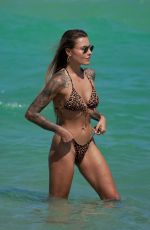 SOPHIA THOMALLA in a Leopard Print Bikini at a Beach in Miami 03/19/2025