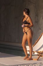 TAO WICKRATH in SKIMS Bikini at a Photoshoot at Joshua Tree 03/28/2025