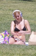 ADDISON RAE in a Cowgirl Hat and Mini Skirt and Tans in Bikini with Friends at Silver Lake Park 04/07/2025