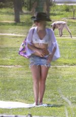 ADDISON RAE in a Cowgirl Hat and Mini Skirt and Tans in Bikini with Friends at Silver Lake Park 04/07/2025