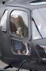 ANA DE ARMAS and Tom Cruise Arrives in London on His Helicopter 04/15/2025