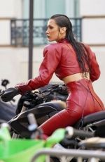 BELLA HADID in a Red Leather Satsuit Filming New Fashion Video in Paris 04/10/2025