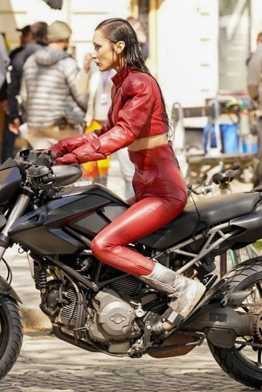 BELLA HADID in a Red Leather Satsuit Filming New Fashion Video in Paris 04/10/2025