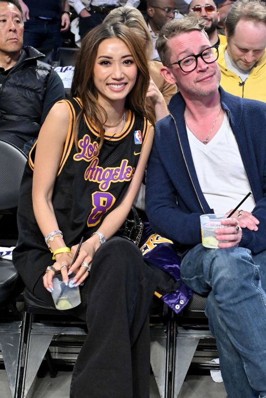 BRENDA SONG and Macaulay Culkin at NBA Game Between L.A. Lakers and Minnesota Timberwolves in Los Angeles 04/22/2025