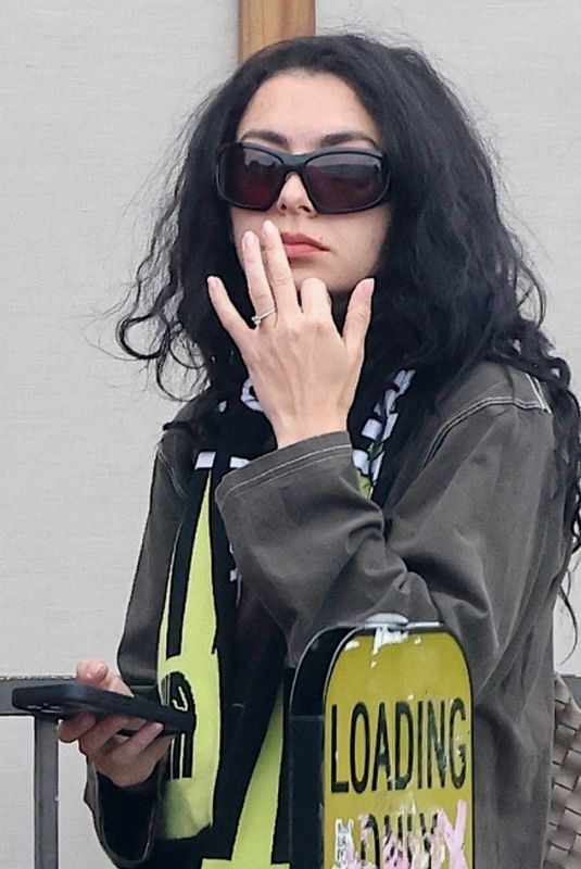 CHARLI XCX Showing off Her Engagement Ring During Lunch at All Time in Los Angeles 04/16/2025