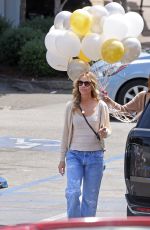 CHRISTINE BAUMGARTNER with a Huge Bunch of Balloon