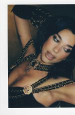 DUA LIPA at a Photoshoot 04/04/2025