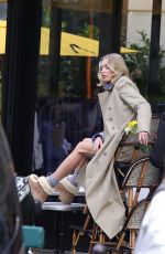 ELSA HOSK at a UGG Photoshoot Near Arc de Triomphe 04/18/2025