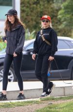 EMILY OSMENT on a stroll with Her Pup in Los Angeles 04/23/2025