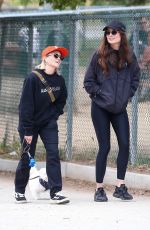EMILY OSMENT on a stroll with Her Pup in Los Angeles 04/23/2025