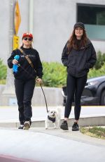 EMILY OSMENT on a stroll with Her Pup in Los Angeles 04/23/2025