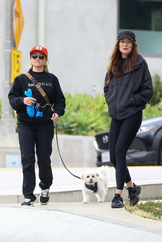 EMILY OSMENT on a stroll with Her Pup in Los Angeles 04/23/2025
